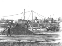 Unloading coal along canal in 1901